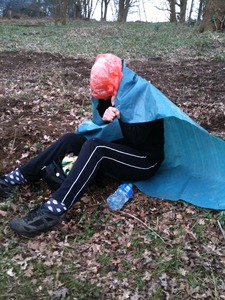 Bag Lady sheltering from rain